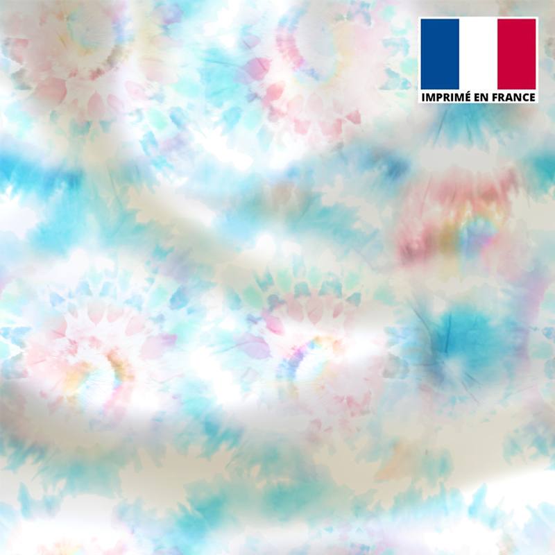 Tissu microfibre écru motif tie and dye fluide bleu et rose
