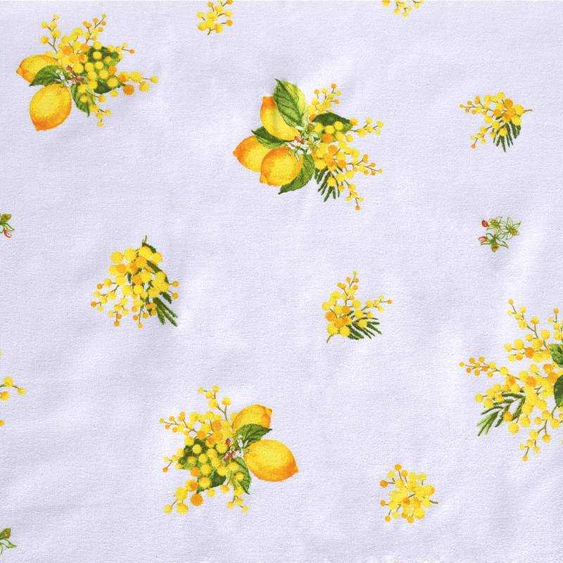 Tissu provençal blanc motif citron et mimosa