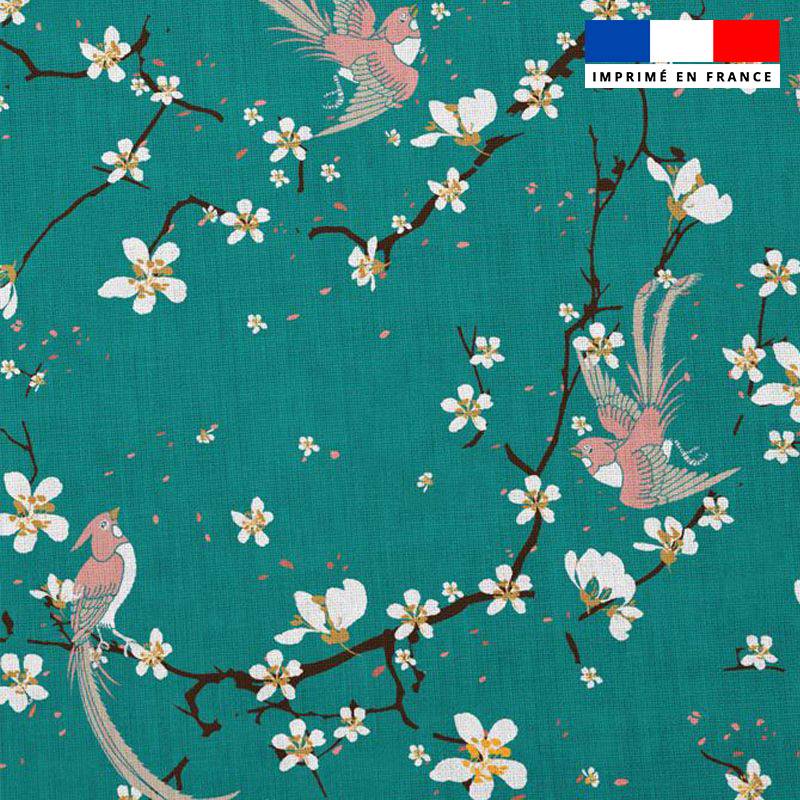 Popeline de coton bleu canard peigné motif fleur de cerisier et oiseau