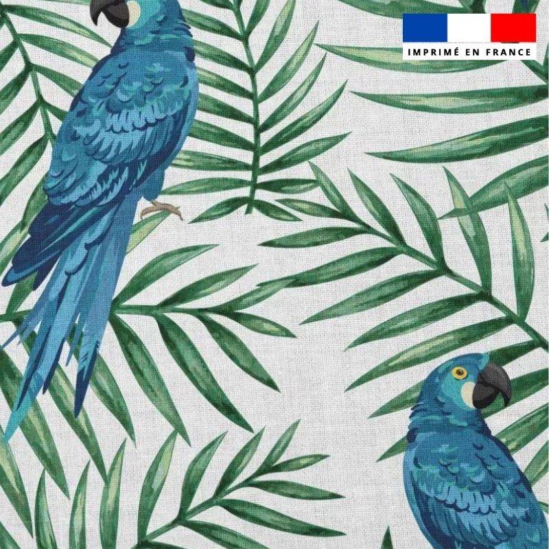 Popeline de coton peigné blanche motif perroquet bleu et feuille tropicale