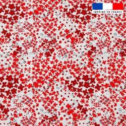 Popeline de coton peigné blanche motif fleurs des champs rouges